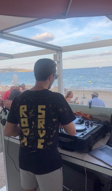 ROOM:SRVC DJ performing live at Ibiza beach club