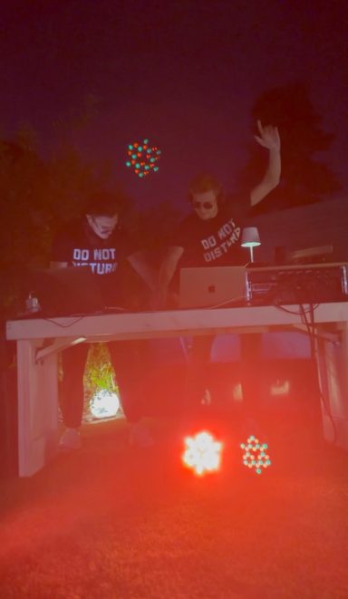 ROOM:SRVC live DJ set with red lights at Rheinriff Düsseldorf